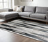 4' X 6' Black Silver and Gray Abstract Power Loom Area Rug